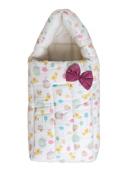 Baby sleeping bag with colorful animal pattern and a pink bow on a white background