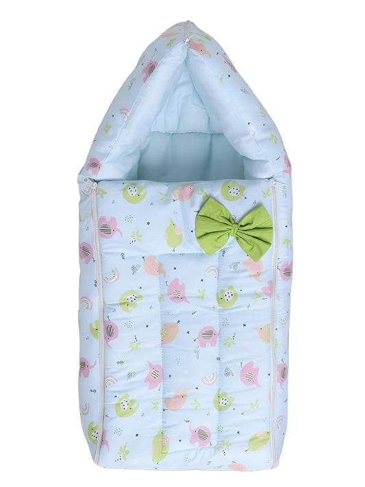 Baby sleeping bag with elephant pattern and green bow on a white background