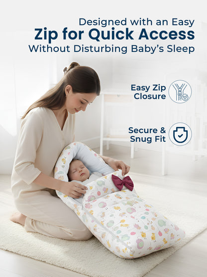 Woman holding a baby wrapped in a colorful swaddle with text about easy zip closure.