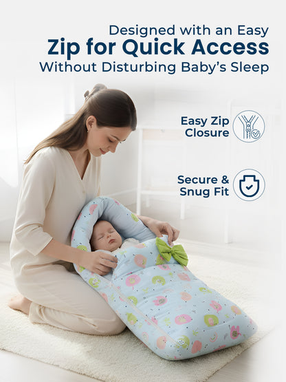 Woman holding a baby in a baby wrap with text about easy zip closure and secure fit.