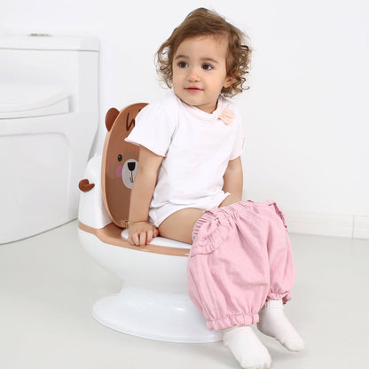 baby sitting on toilet seat brown color 