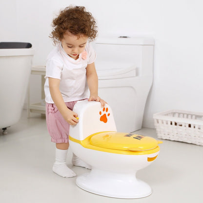 Baby doing flush on on potty seat yellow